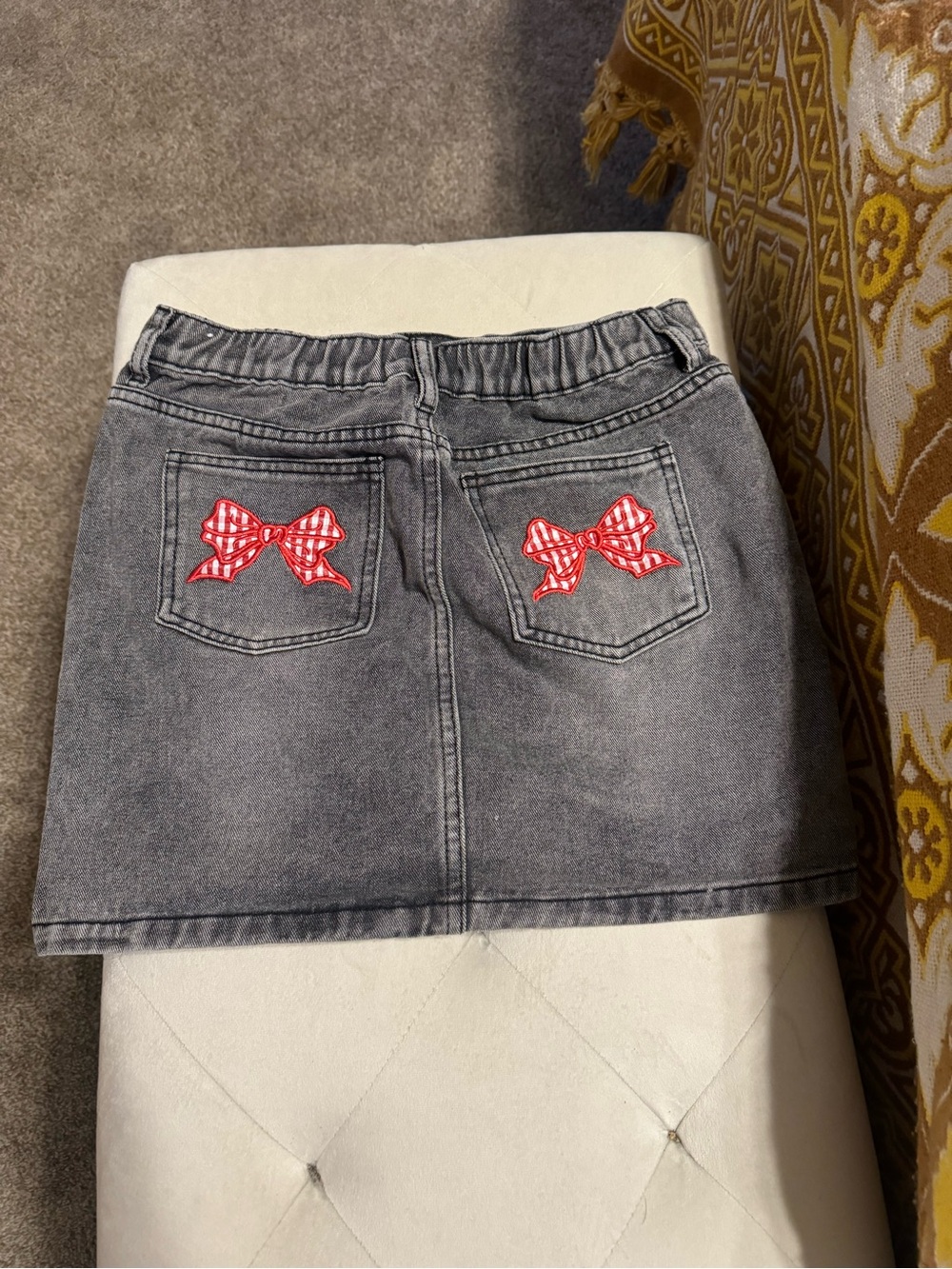 Asphalt Gray Denim Mini Skirt with Red Bow Pocket Appliqués